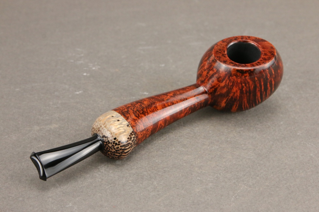 Apple asimmetrica con inserto in Black Palm