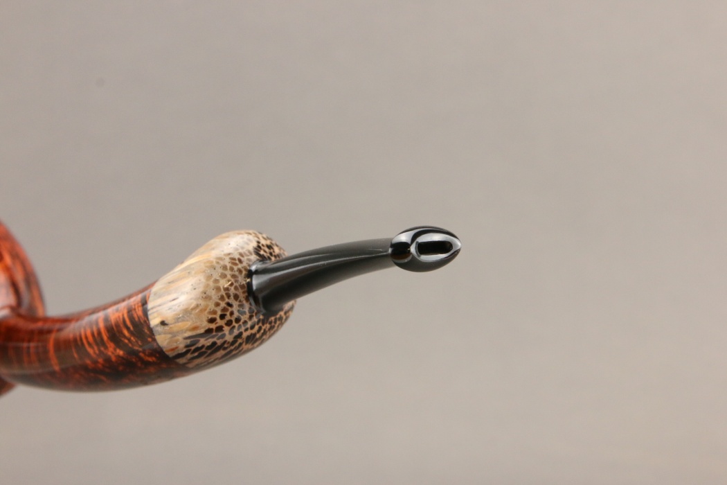 Apple asimmetrica con inserto in Black Palm